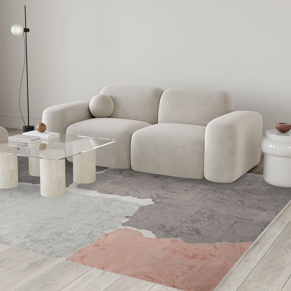 Retro style colorful carpet placed in a modern living room under a coffee table