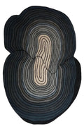 An abstract oval wall art piece with concentric organic lines in black, charcoal, gray, and cream, centered on a light off-white background with a soft drop shadow.