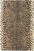 Beige rug with black leopard print pattern on a white background