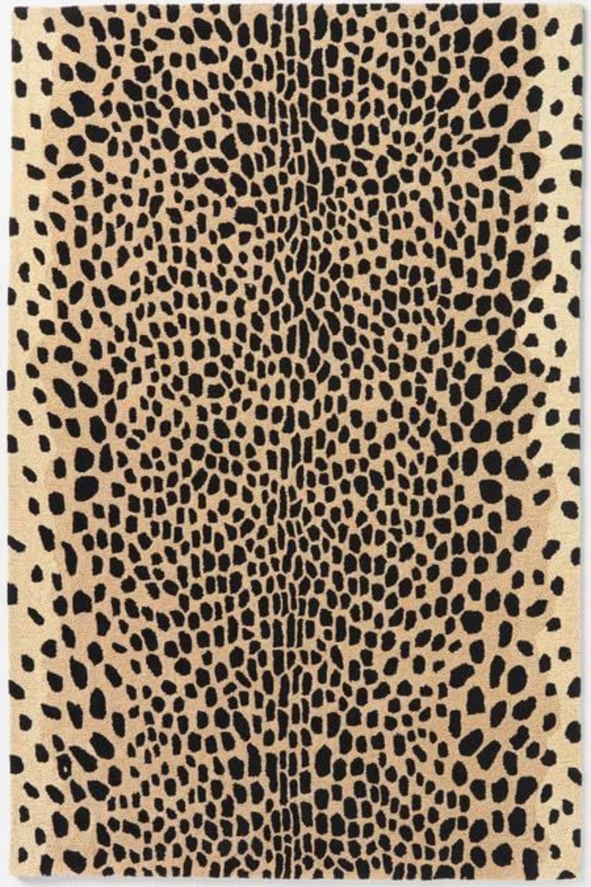 Beige rug with black leopard print pattern on a white background