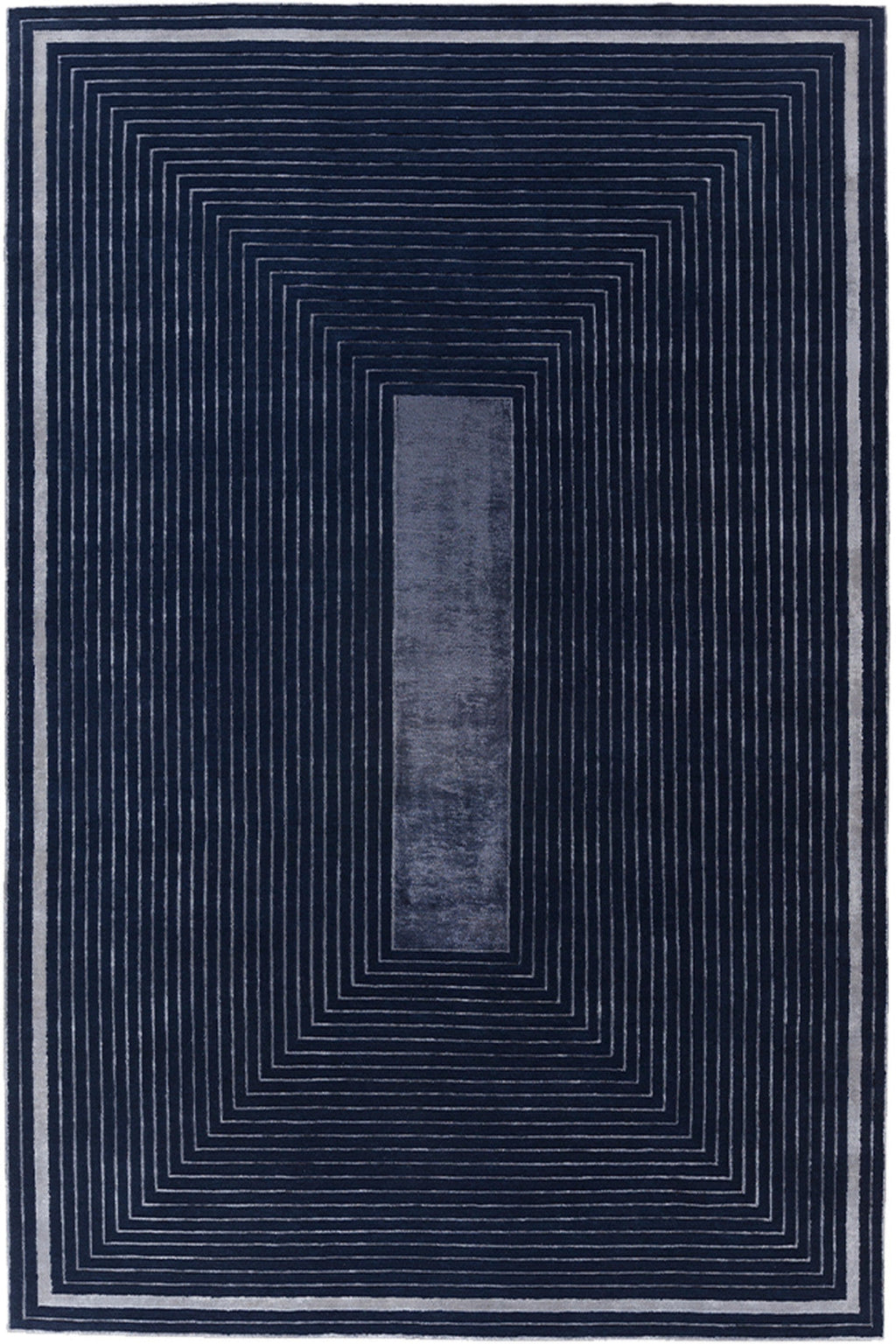 A rectangular area rug with a geometric design featuring concentric rectangular patterns and a central vertical stripe, in shades of navy blue and gray.