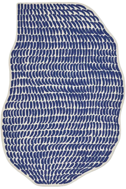 Blue and white patterned rug on a white background