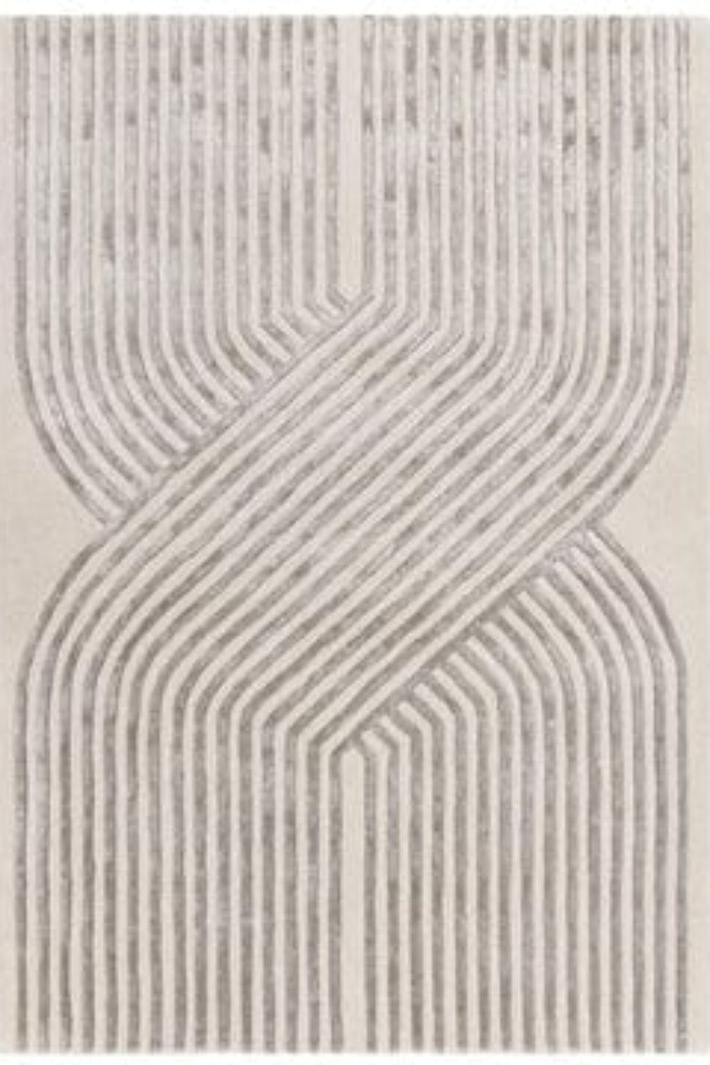 Textured area rug with wavy line pattern on a white background | kaleenvibe