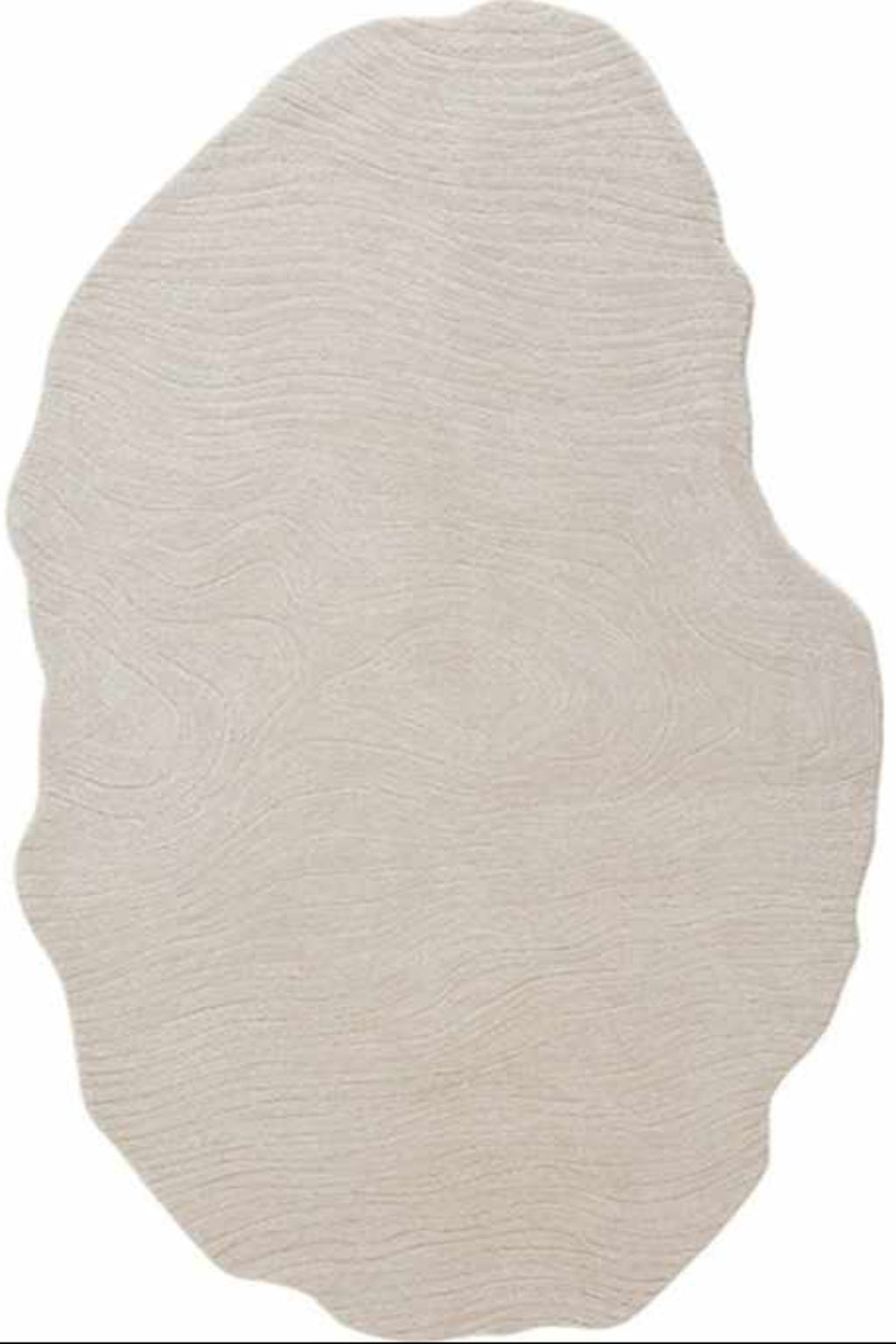 Patchwork irregular organic shape modern rug in neutral tones