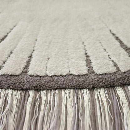 Close-up of premium hand-tufted texture and intricate Pulse pattern