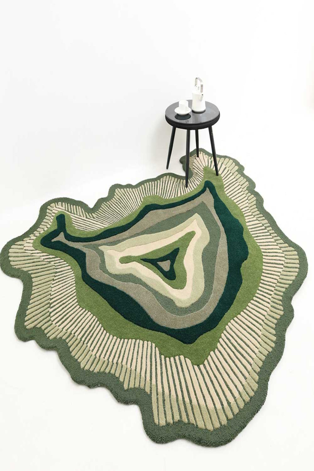 Geometric patterned rug on a white background