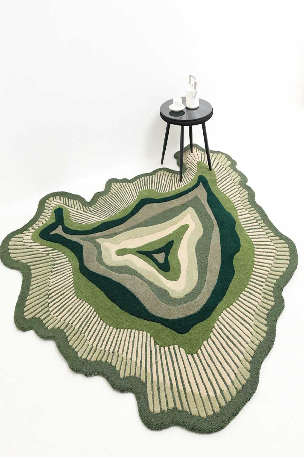 Geometric patterned rug on a white background
