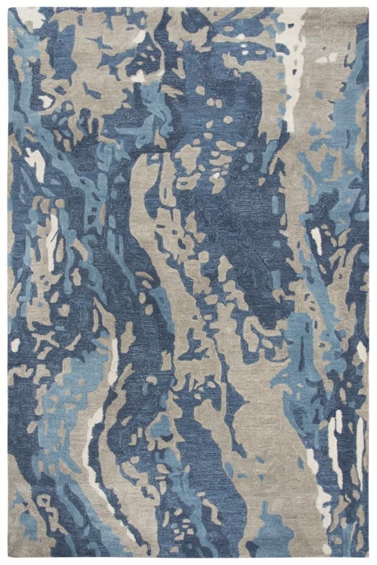Blue and beige abstract patterned rug kaleenvibe