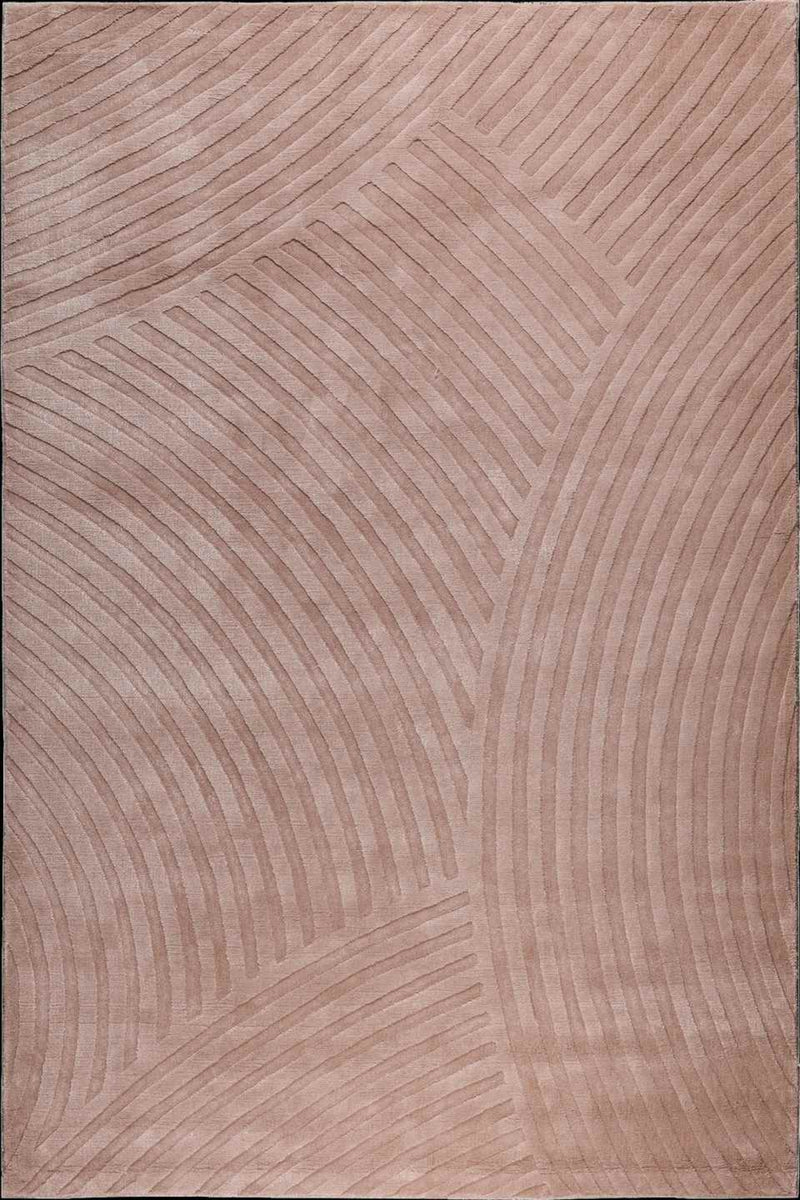 A close-up of a textured rug or fabric in a warm taupe-beige color, featuring a raised geometric pattern of curved lines.