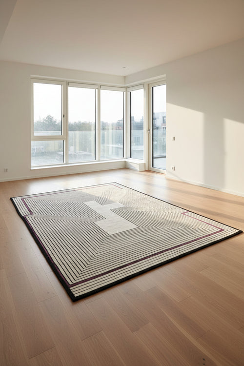 A square area rug with a geometric maze-like pattern of concentric lines in beige, brown, and muted purple on a white background.