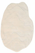 Handmade rug with wavy pattern on a white background, branded 'KALEENVIBE
