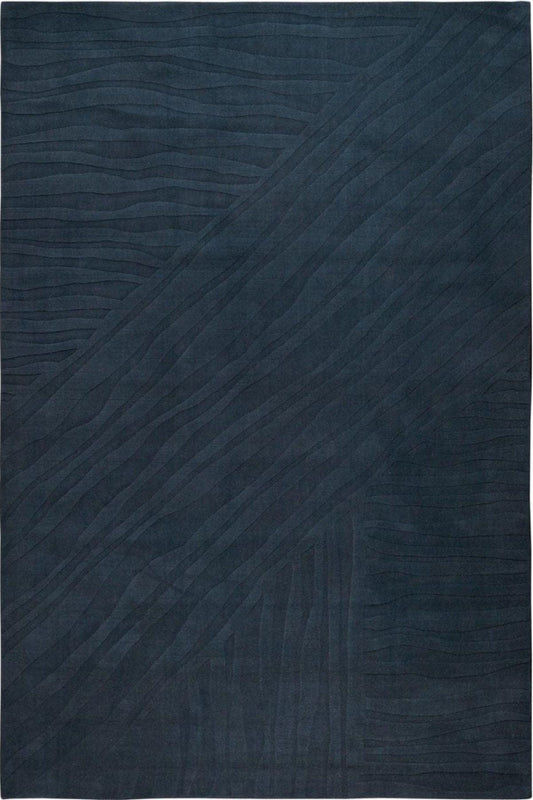 Dark blue textured rug on a white background
