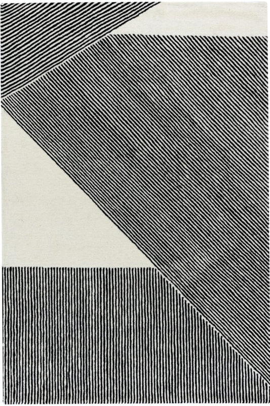 Rug with black and white geometric pattern on a white background | kaleenvibe