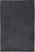 A dark charcoal gray area rug with a textured, horizontally ribbed pattern filling the entire frame.