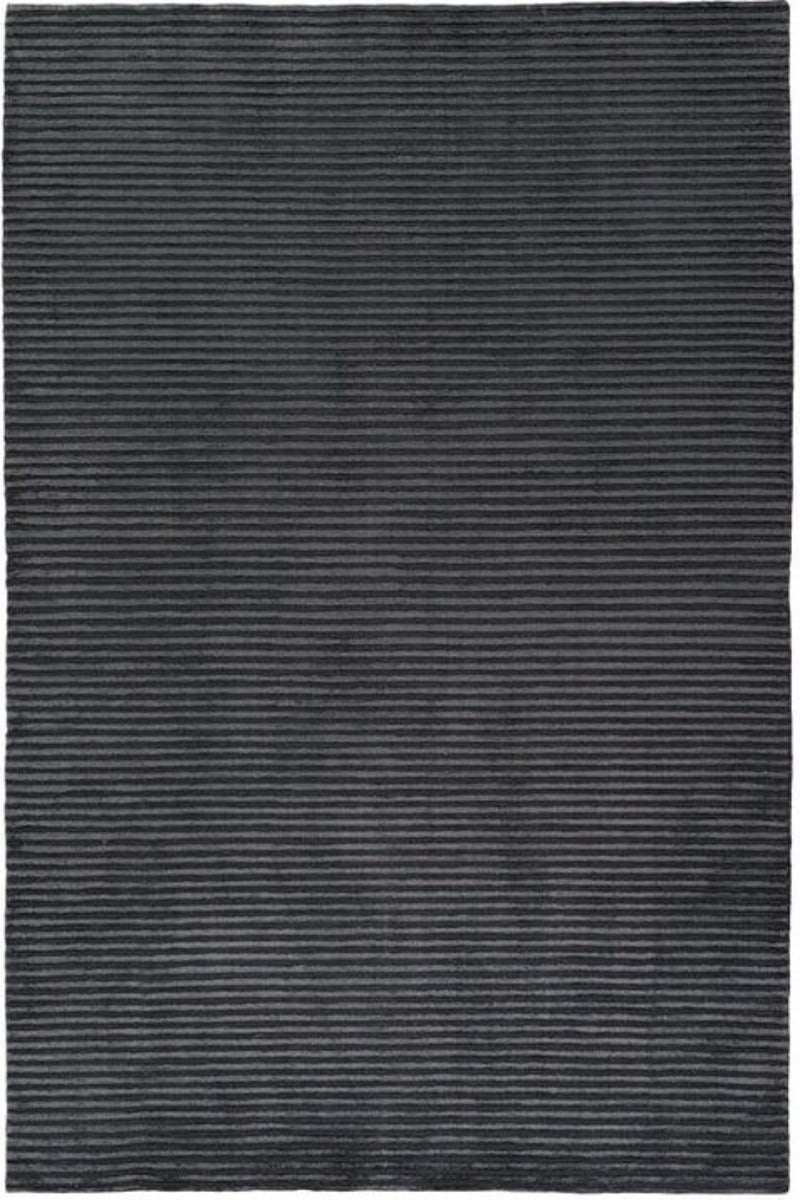 A dark charcoal gray area rug with a textured, horizontally ribbed pattern filling the entire frame.