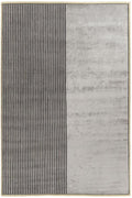 A rectangular area rug with a modern minimalist design, featuring a vertical split with a left panel of thin dark vertical stripes on a light gray background and a right panel of mottled light gray texture.
